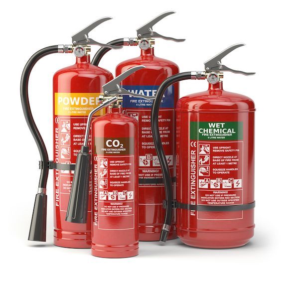 Fire extinguisher in a wall-mounted safety cabinet