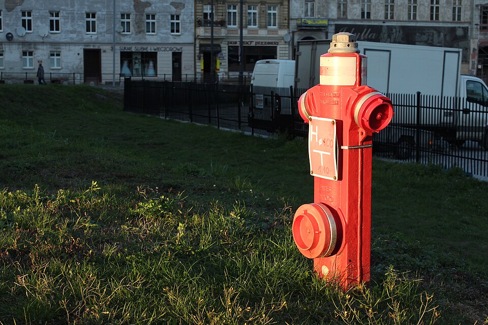 Outdoor red fire hydrant for firefighting water supply